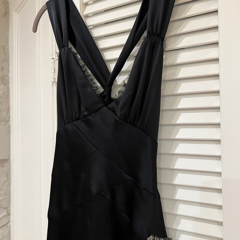 ABS black cocktail dress with asymmetrical hem and twist back
